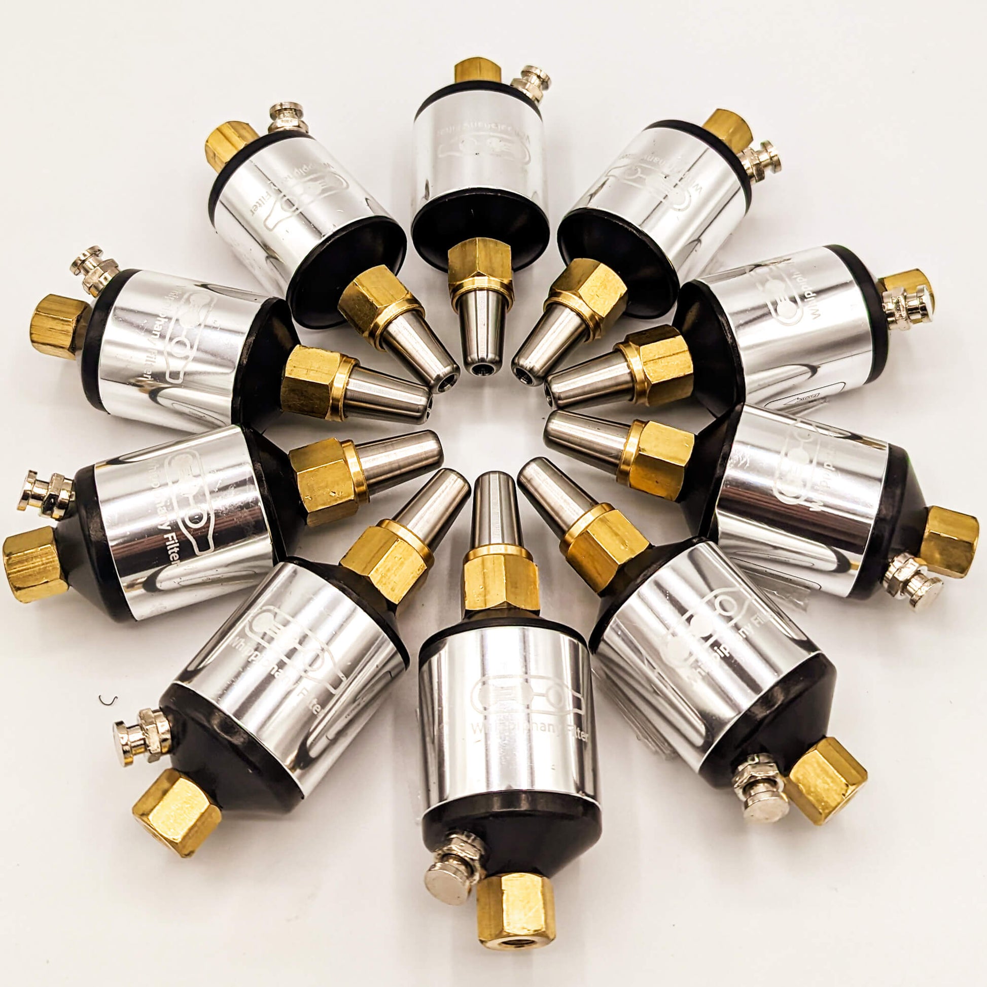 Ten Whippiphany N2O and NOS filters arranged in a bundle package, designed for nitrous oxide filtration and regulators.